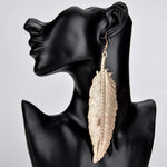 Load image into Gallery viewer, Gold Feather Bird Earrings
